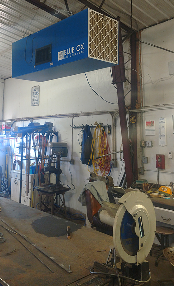 A Blue Ox air filtration system installed in a welding workshop to remove smoke and fumes.